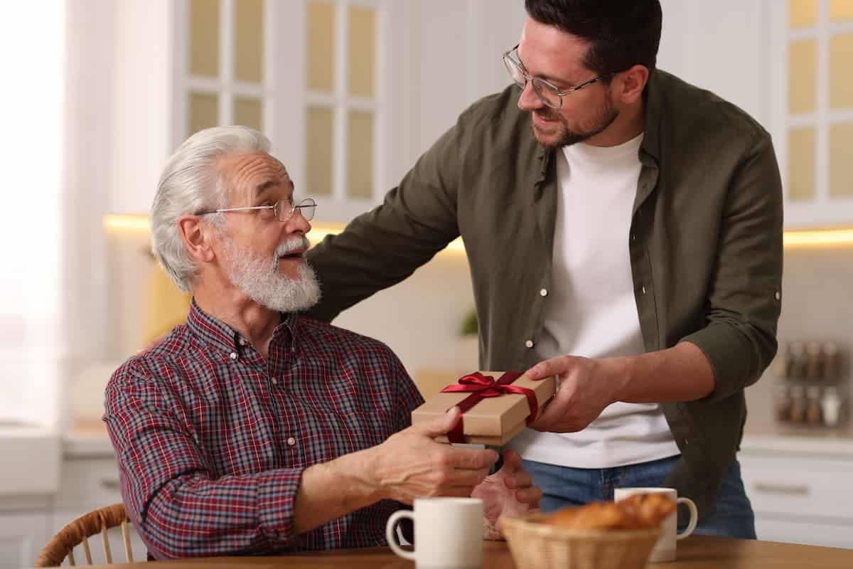 The Abbey | Son giving his senior father a gift