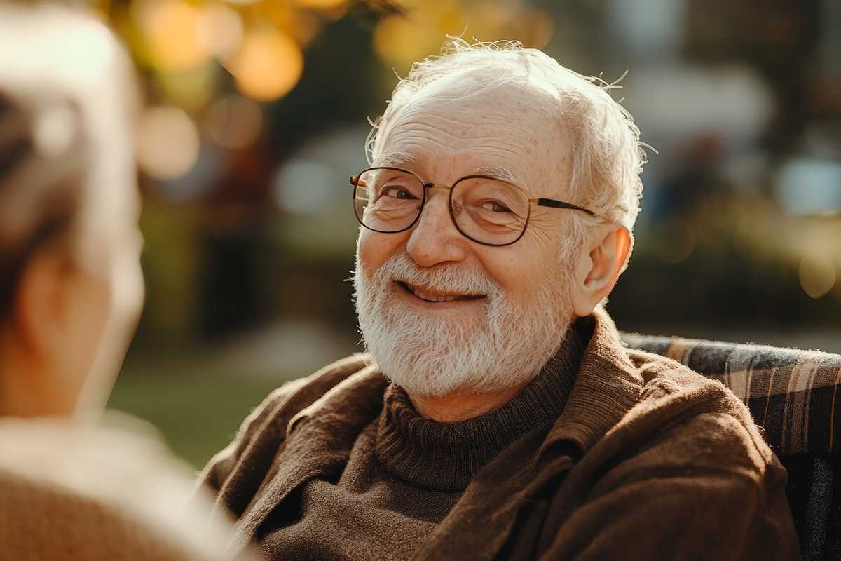 The Abbey | Happy Senior Couple Sitting Outside- Talking and Relaxing